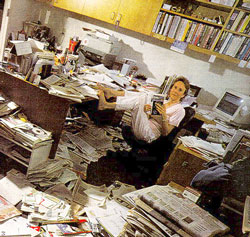 Photo of a disorganized office.